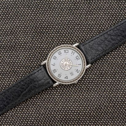 null HERMES - Saddler 

Steel watch, white enamel dial with Arabic numerals painted...