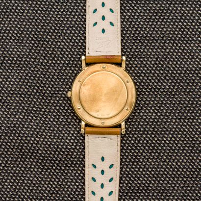 null TISSOT 

Bracelet watch in 18-carat yellow gold (750 thousandths), round case...