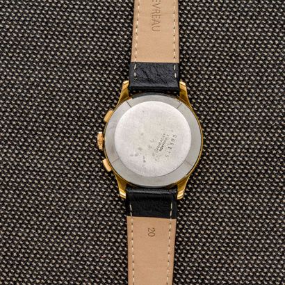 LE PHARE Montre bracelet chronographe en métal doré et acier à fond clippé. Le cadran...