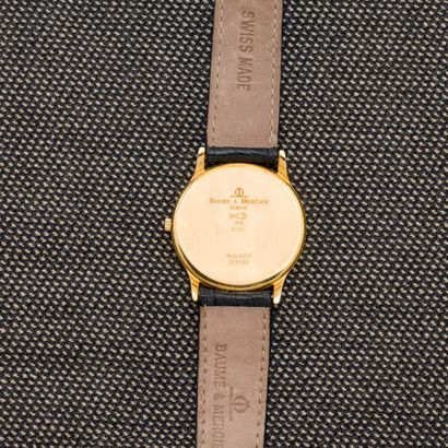 BAUME & MERCIER Extra-flat wristwatch in 18-carat yellow gold (750 thousandths)....