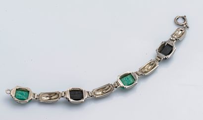 null Bracelet moderniste en argent (800 millièmes) composé de sept motifs cylindriques...