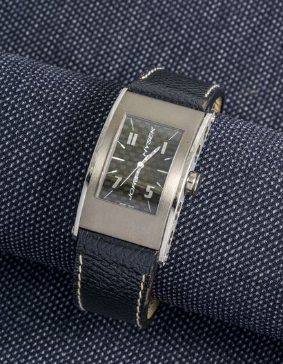 JORG HYSEK Rectangular steel watch with screwed back (signed). Dial with checkerboard...