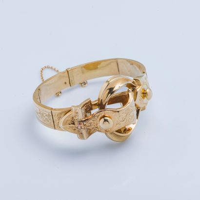 null Bracelet semi-rigide en or jaune 18 carats (750 millièmes) formant une boucle...