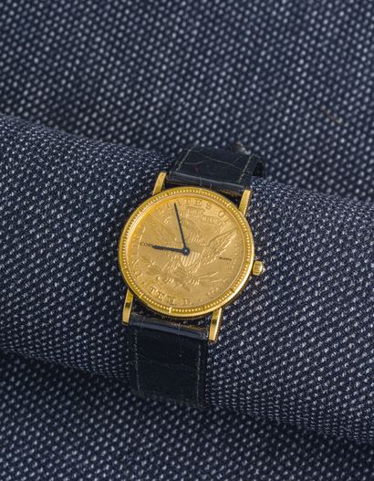 CORUM Circa 1980

Round watch, the case formed of a 10 US Dollar coin dated 1901...
