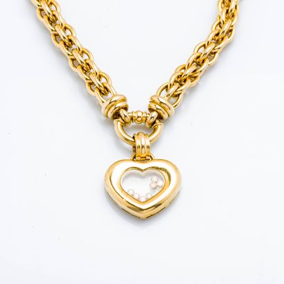 CHOPARD Collier «Happy Diamonds» Cœur en or jaune 18 carats (750 millièmes) composé...