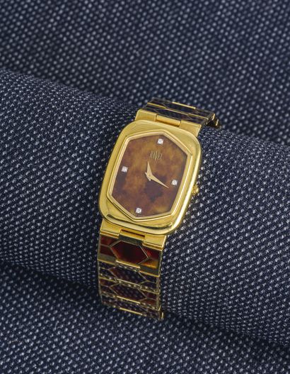 RAVEL, About 1980

Cushion-shaped watch in 18K yellow gold (750 thousandths) with...