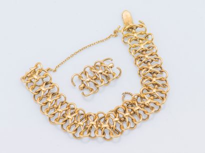 null Bracelet gourmette en or jaune 18 carats (750 millièmes) composé de maillons...