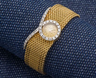 PIAGET Ladies' watch bracelet in 18K yellow gold (750 ‰) and platinum (950 ‰). The...