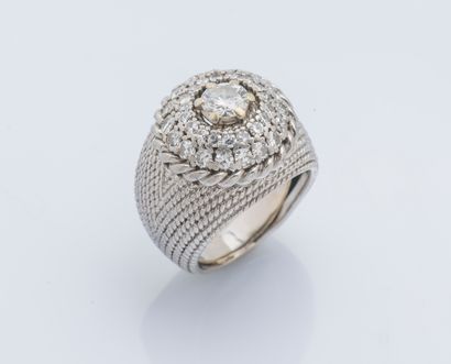 null Platinum (950 ‰) dome ring adorned with a diamond weighing approximately 0.75...