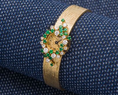 ANDRE COL Bracelet montre de dame en or jaune 18 carats (750 ‰) la lunette sertie...