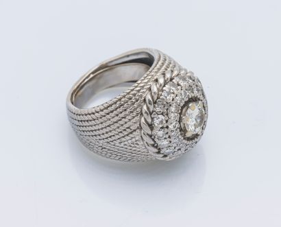 null Platinum (950 ‰) dome ring adorned with a diamond weighing approximately 0.75...