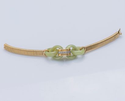 null Bracelet en or jaune 18 carats (750 ‰) à maille tubogaz orné de quatre anneaux...