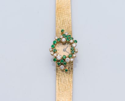ANDRE COL Bracelet montre de dame en or jaune 18 carats (750 ‰) la lunette sertie...