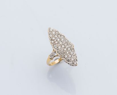 null An 18K yellow gold (750 ‰) marquise ring set with thirty-three round diamonds....