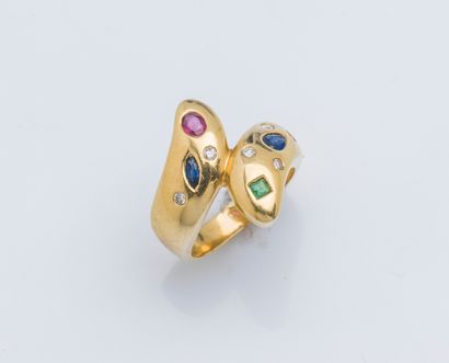null An 18K (750 ‰) yellow gold toi et moi ring accented with diamonds, rubies, sapphires...