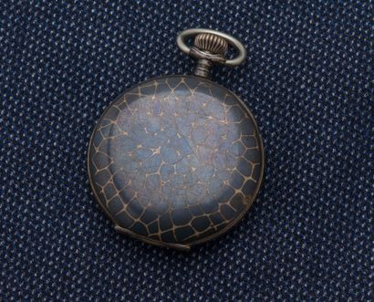 null A silver pocket watch (800 ‰), the polychrome enamelled dial decorated with...
