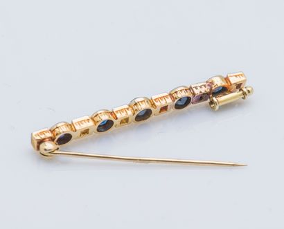 null 
18K yellow gold (750 ‰) and platinum (950 ‰) barrette brooch set with five...