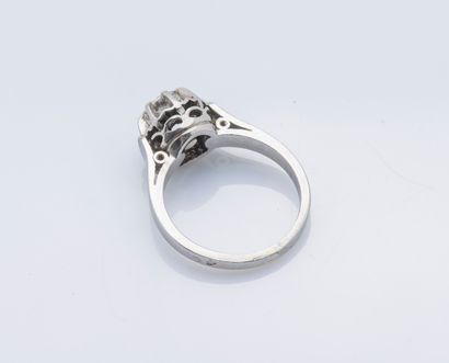 null Platinum (950 ‰) solitaire ring set with a brilliant-cut diamond weighing approximately...