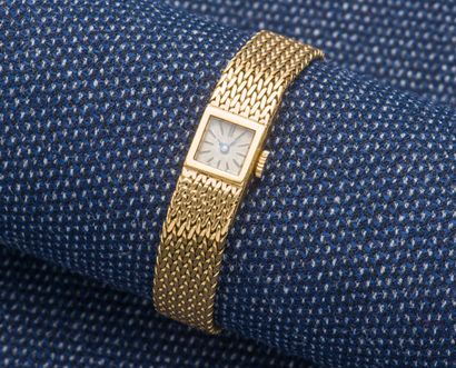 null Bracelet montre de dame en or jaune 18 carats (750 ‰), le boîtier rectangulaire...