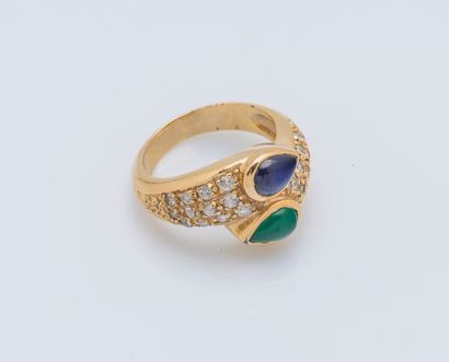 null 
Metal ring forming a you and me set with a sapphire and chrysoprase cabochon,...