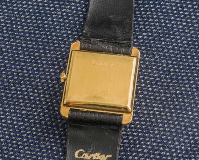 CARTIER Yellow gold-plated Tank model watch, the rectangular case with clipped back,...