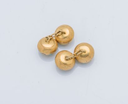 null Paire de boutons de manchette en or jaune 18 carats (750 ‰) texturé à décor...