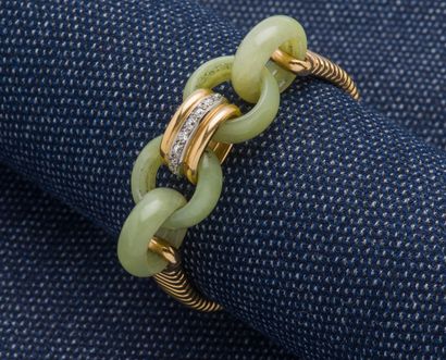 null Bracelet en or jaune 18 carats (750 ‰) à maille tubogaz orné de quatre anneaux...