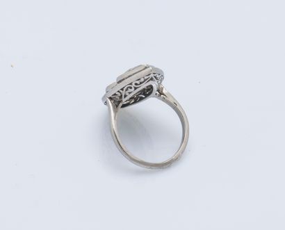null 
NON VENU Platinum ring (950 ‰), the bezel forming a navette set with two faceted...