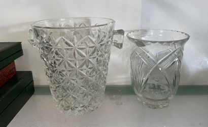 null Lot including: a cut crystal ice bucket, a cut glass vase, a DAUM France crystal...