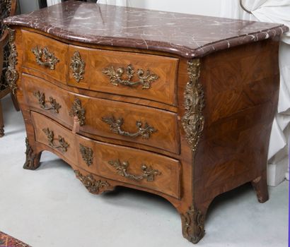 null Grave chest of drawers in veneer with leaf inlays opening with 4 drawers on...