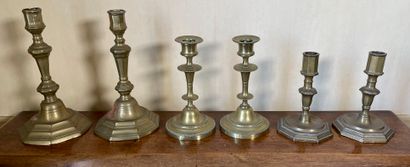 null Three pairs of brass candlesticks Louis XVI style 

H. 22, 17, 14 cm