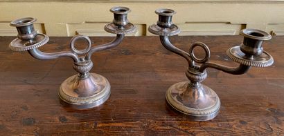 null A pair of bronze candelabras with two arms of lights and gadrooned decoration...