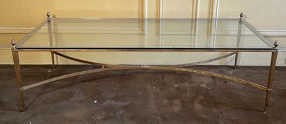 Dans le goût de la Maison JANSEN, Brass coffee table with glass top 

39,5 x 123...