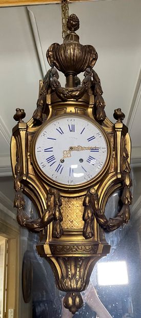 null Gilt bronze and metal wall clock decorated with garlands and topped with a cassolette,...