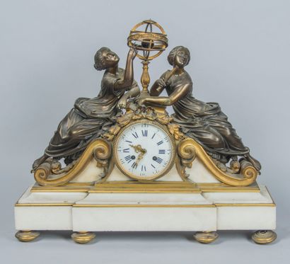 null Gilt bronze and white marble mantel set with a clock and two four-light girandoles...