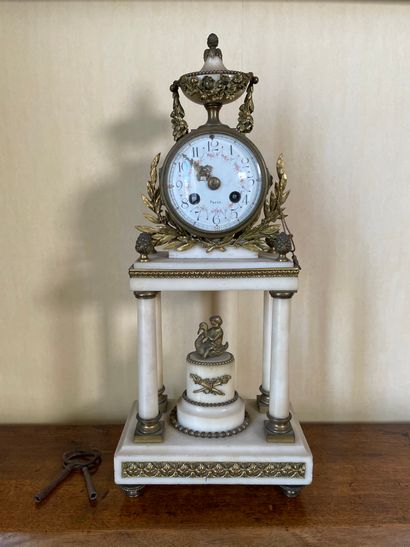 null Portico clock in alabaster and gilt bronze, the white enamelled dial decorated...
