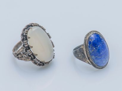  Set of two rings, the mounts in silver (925 ‰) chased set for one with a white agate...