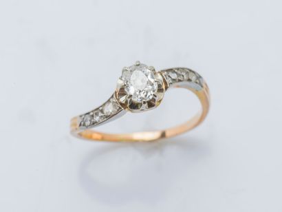  An 18K (750 ‰) yellow gold ring set with a cushion diamond calibrating 0.45 carat...