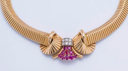  An 18k yellow gold (750 ‰) choker necklace, the choker formed of two cutaway turbogas...