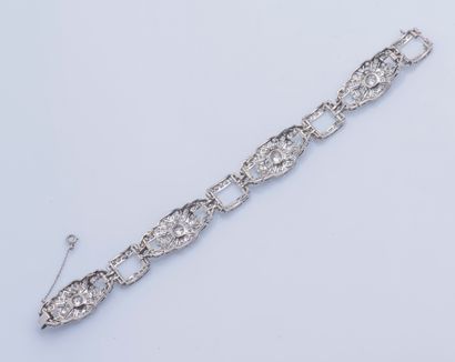 null Bracelet ruban articulé en platine (950 ‰) à maillons fleuron et rectangulaires...