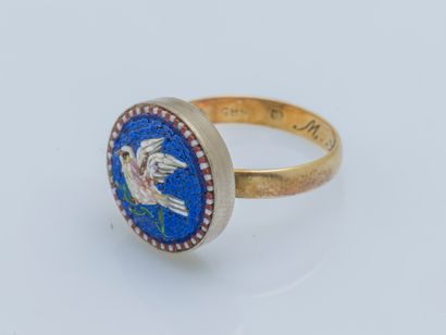 null 
Bague formée d’une alliance en or jaune 14 carats (585 ‰) et métal gravée M.L....