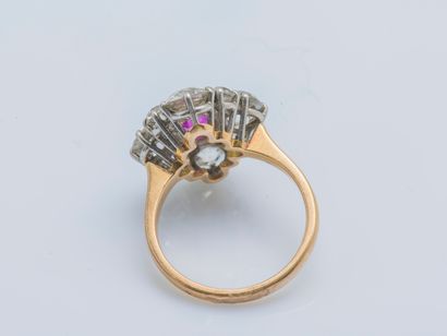 null 
An 18k yellow gold (750 ‰) and platinum (850 ‰) ring the bezel forming a diamond...
