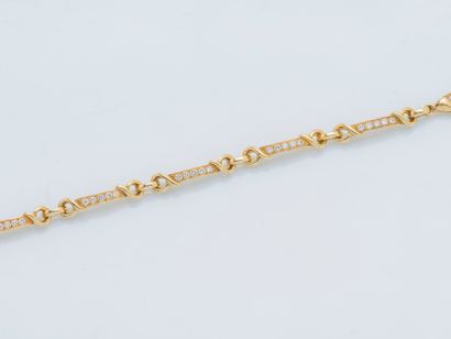 null Bracelet gourmette en or jaune 18 carats (750 ‰) composé de six maillons barrette...