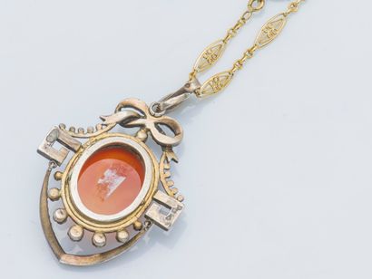 null Silver pendant (800 ‰) of baluster form adorned with a cameo on cornelian featuring...