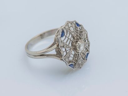 null 
Platinum (950 ‰) and 18-carat (750 ‰) white gold ring the oval basket drawing...