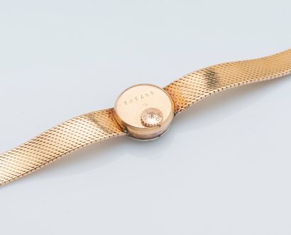 OMEGA Bracelet montre de dame en or jaune 18 carats (750 ‰), le boîtier rond à fond...