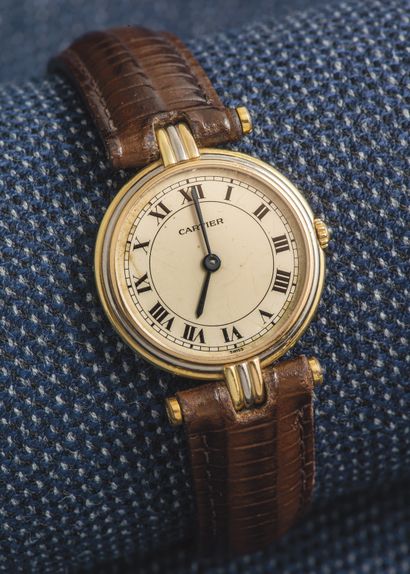 CARTIER Watch model Vendôme Trinity, the round case in gold of three colors 18 carats...