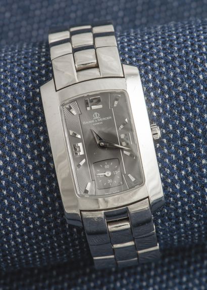 BAUME & MERCIER, vers 2000 Hampton Milleis rectangular curvex steel watch with screwed...