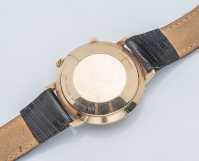 JAEGER-LECOULTRE, années 1960 Memovox alarm watch. Round case in 10K yellow gold...