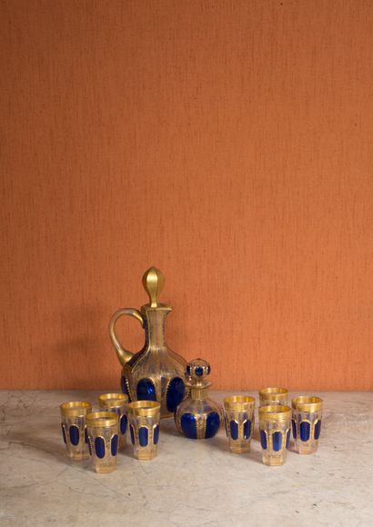 Blue and gold painted glass liquor set including...